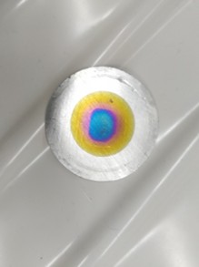 Target produced via evaporation of 144Sm onto an aluminum disk